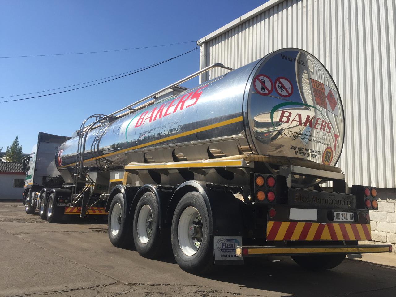 Bakers Tankers polished stainless steel tanker trailer in the yard